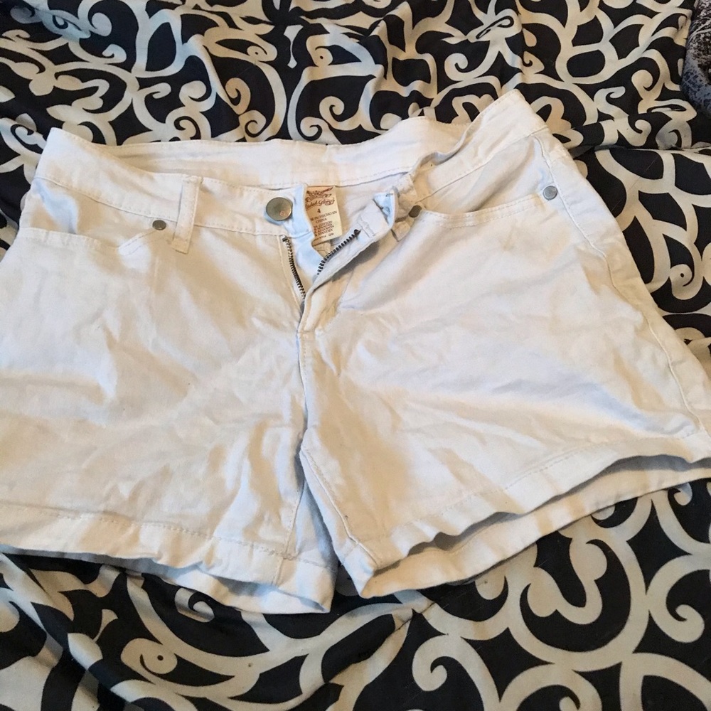 White thigh lengths shorts